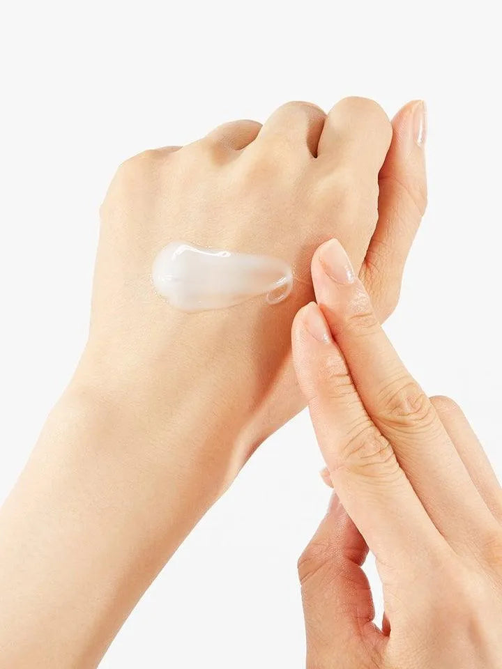 Applying COSRX Advanced Snail 92 All In One Cream to hand, Korean skincare Netherlands