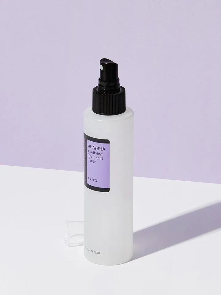 COSRX AHA/BHA Clarifying Treatment Toner bottle on a light purple background at Me Time Groningen
