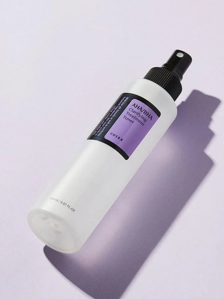 COSRX AHA/BHA Clarifying Treatment Toner bottle on light purple background, Korean skincare