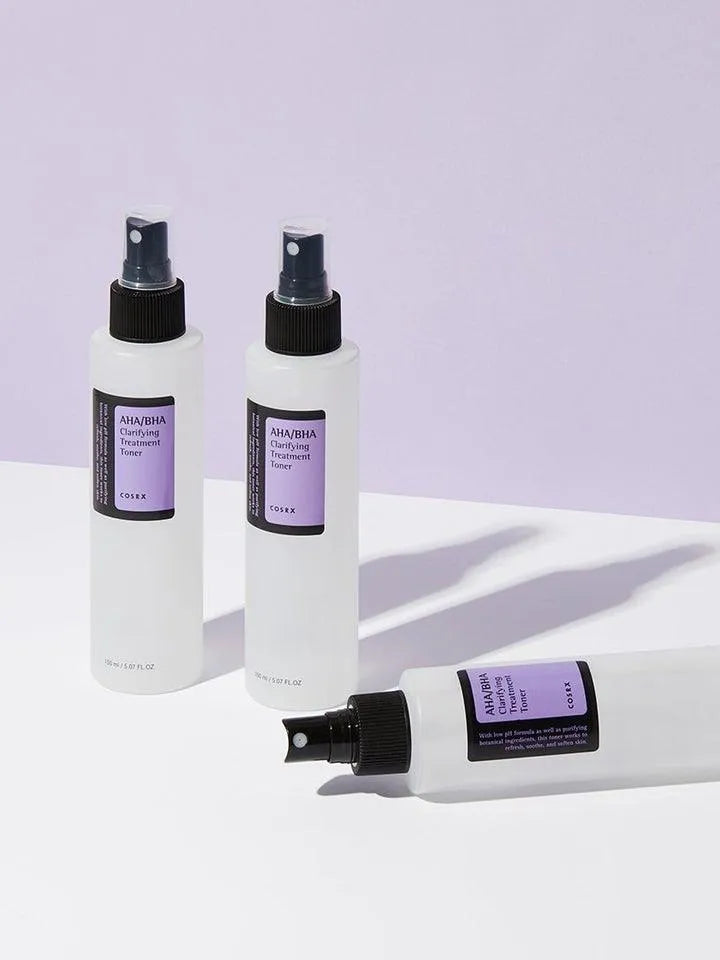 COSRX AHA/BHA Clarifying Treatment Toner bottles on a white and purple background, Korean skincare