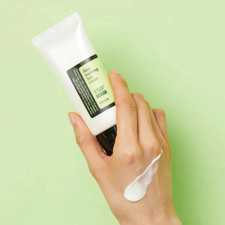 COSRX Aloe Soothing Sun Cream SPF50+ on a hand, Korean skincare product at Me Time Groningen