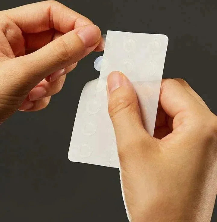 Hand peeling a COSRX Clear Fit Master Patch acne patch, Korean skincare product at Me Time Groningen