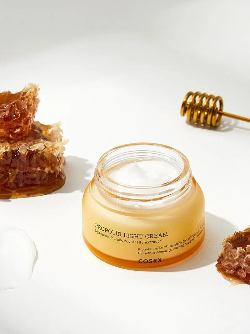 COSRX Propolis Light Cream jar with honeycomb and dipper, Korean skincare at Me Time Groningen