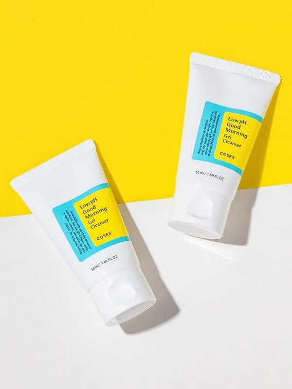 COSRX Low pH Good Morning Gel Cleanser tubes on yellow and white background, Korean skincare product at Me Time Groningen