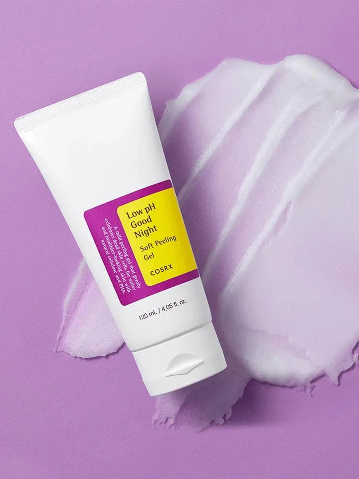 COSRX Low pH Good Night Soft Peeling Gel tube on purple background with cream texture, Korean skincare product Me Time Groningen
