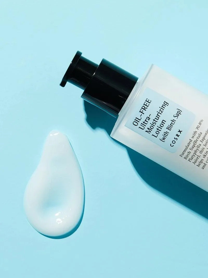 COSRX Oil-Free Ultra-Moisturizing Lotion bottle and product swatch on a light blue background