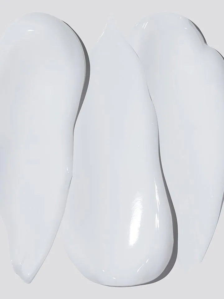 Smooth swatches of COSRX Refresh AHA BHA Vitamin C Daily Cream on a light background