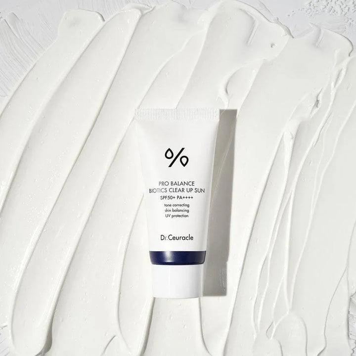 Dr.Ceuracle Pro Balance Biotics Clear Up Sun SPF 50+ Korean sunscreen on white cream smear