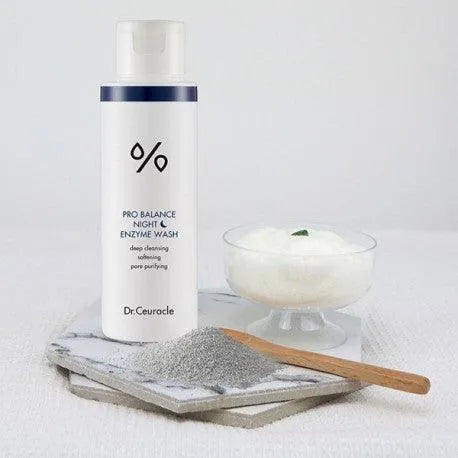 Dr.Ceuracle Pro Balance Night Enzyme Wash with powder and foaming cleanser on marble tray