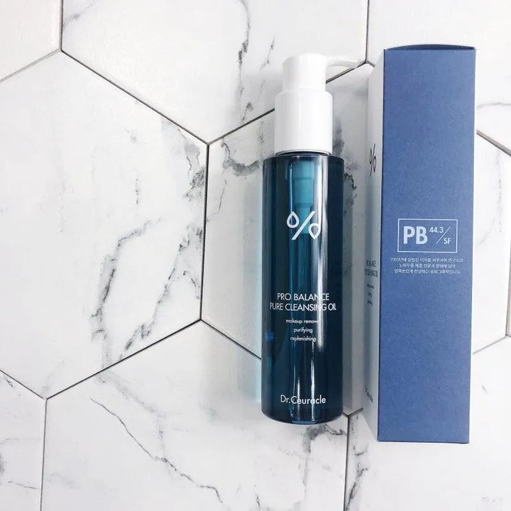 Dr. Ceuracle Pro Balance Pure Deep Cleansing Oil with box on white marble, Korean skincare product