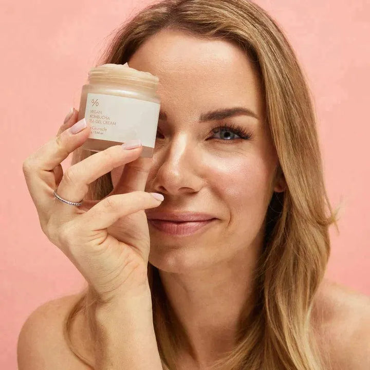 Woman holding Dr. Ceuracle Vegan Kombucha Tea Gel Cream, Korean skincare at Me Time Groningen