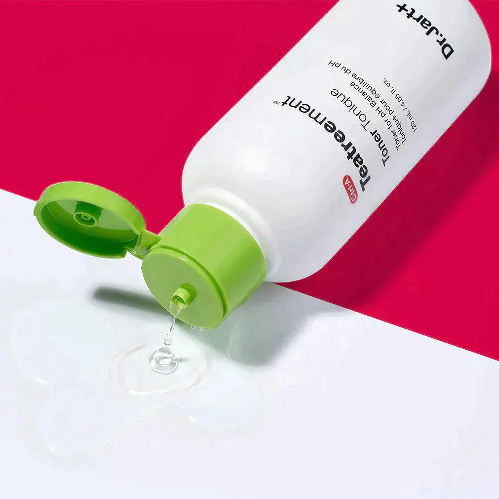 Dr. Jart Teatreement Toner bottle with green cap on pink and white background, Korean skincare