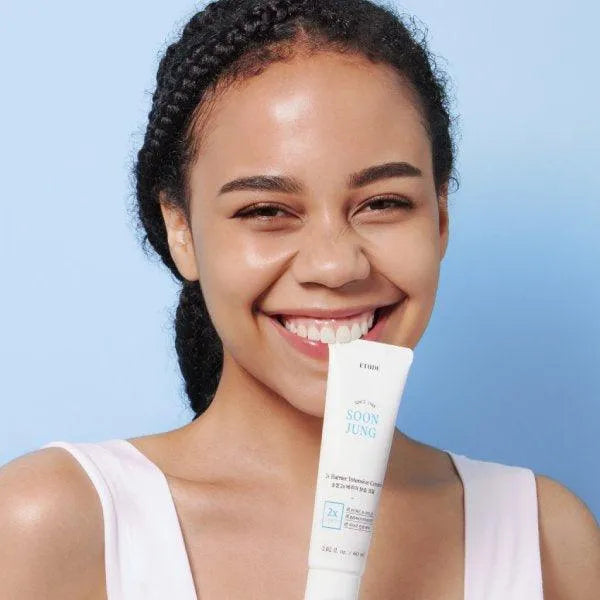 Smiling woman holding Etude House Soon Jung cream, Korean skincare at Me Time Groningen