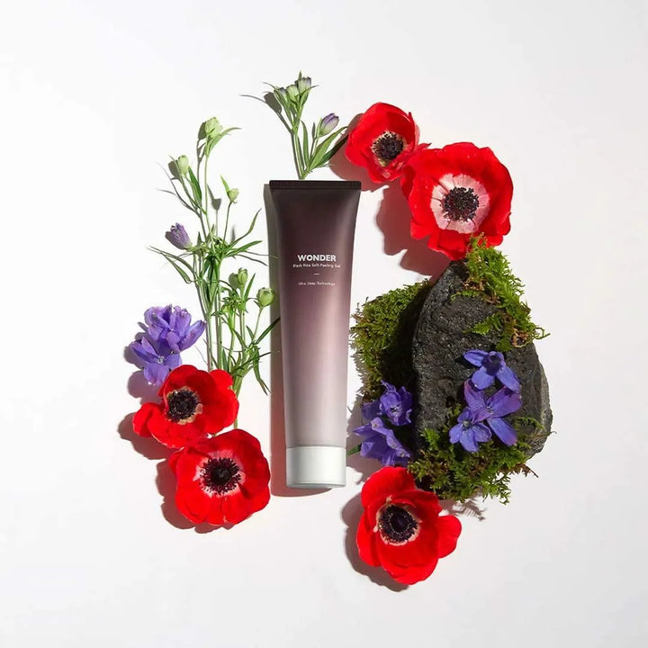 Haruharu Wonder Black Rice Soft Peeling Gel with red and purple flowers, moss, and a black rock, Korean skincare Nederland at Me Time Groningen.
