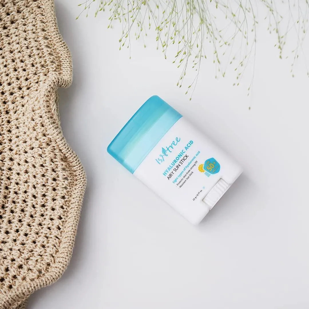 Isntree Hyaluronic Acid Airy Sun Stick with blue cap, Korean skincare product on white background