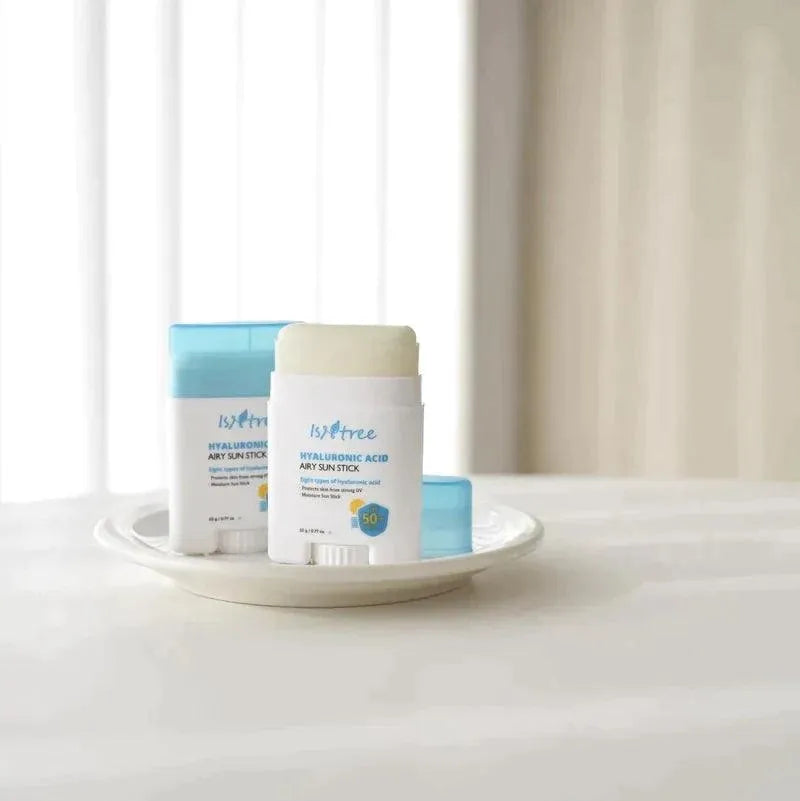 Isntree Hyaluronic Acid Airy Sun Stick SPF 50 Korean skincare on white plate, Me Time Groningen