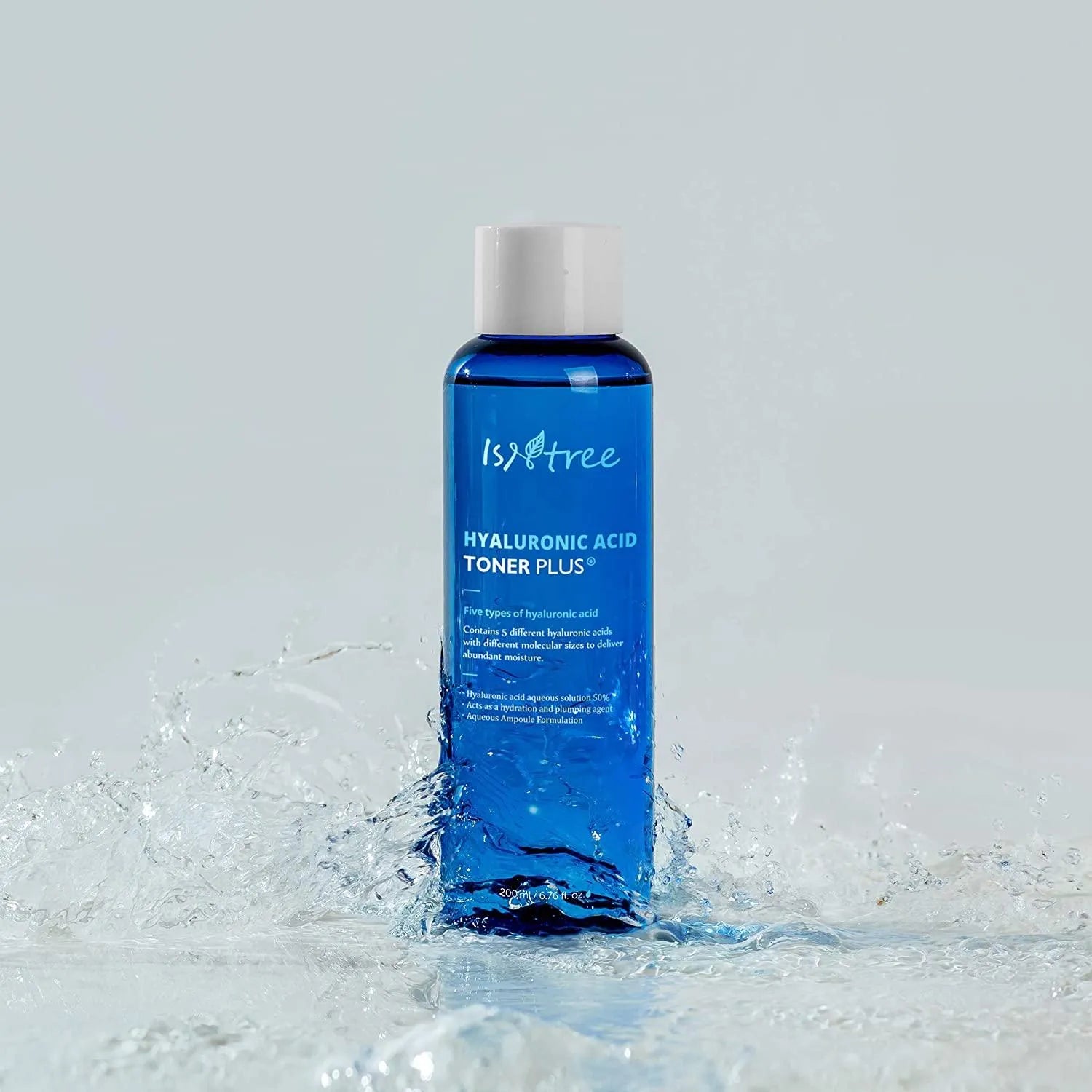 Isntree Hyaluronic Acid Toner Plus bottle standing on wet surface, Korean skincare product