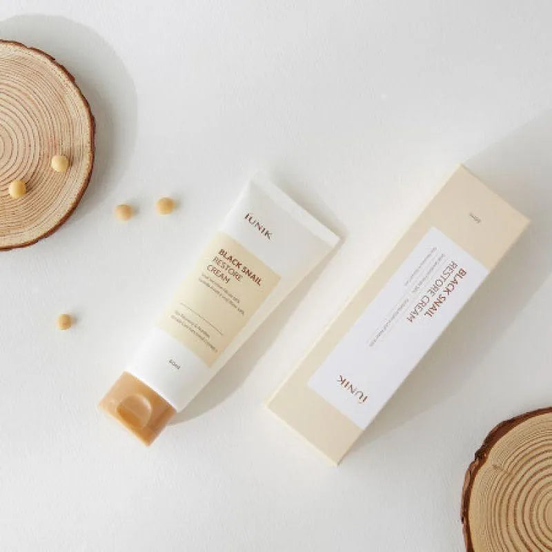 iUNIK Black Snail Restore Cream tube and box on white background, Korean skincare Groningen