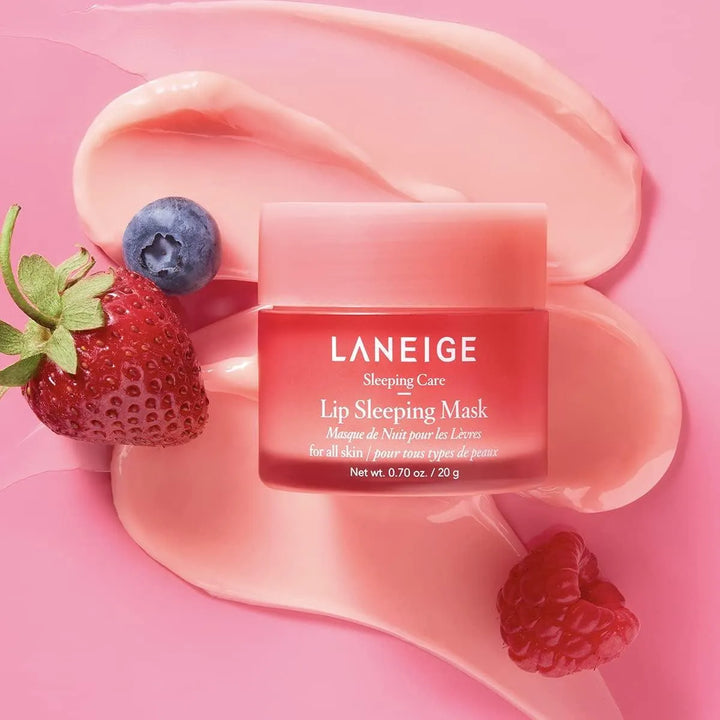 Laneige Lip Sleeping Mask Berry with strawberry, blueberry, raspberry on pink background, Korean skincare