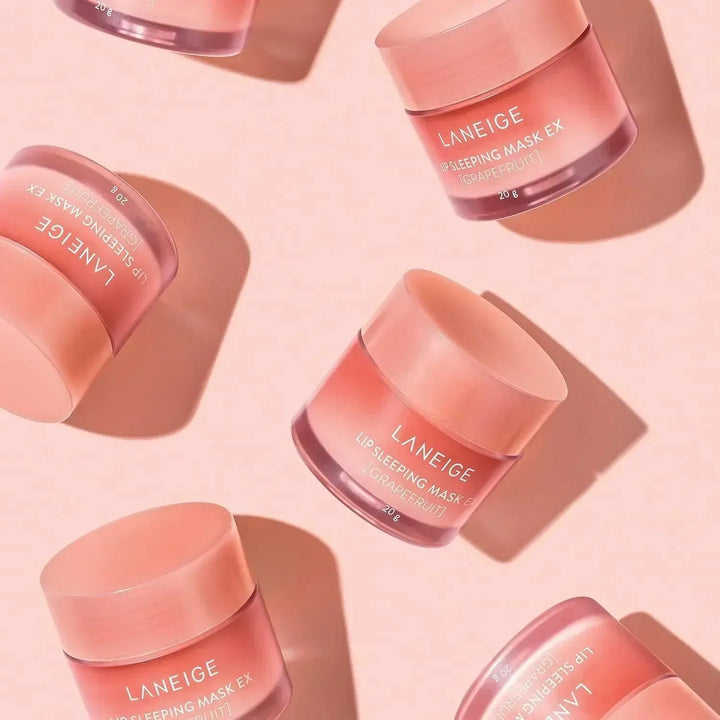 Laneige Lip Sleeping Mask EX Grapefruit jars on a pink background, Korean skincare Nederland