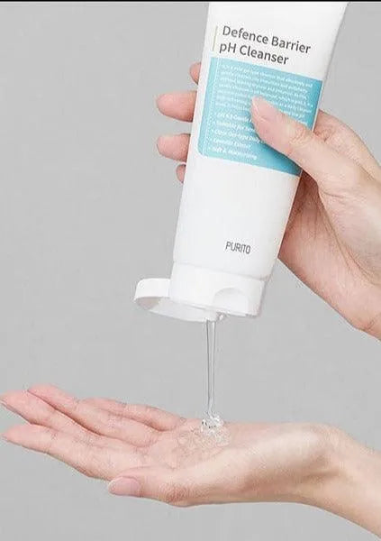 Purito Defence Barrier pH Cleanser being dispensed onto hand, Korean skincare Nederland product