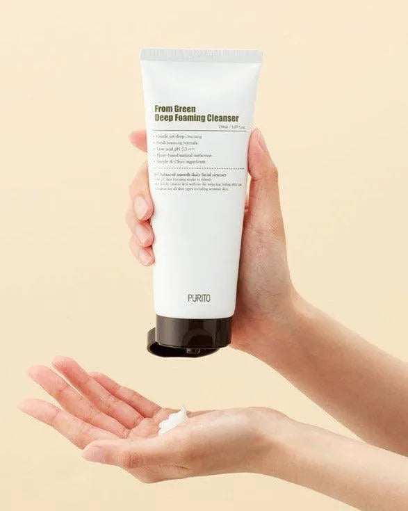 Hand holding Purito From Green Deep Foaming Cleanser, Korean skincare Nederland product