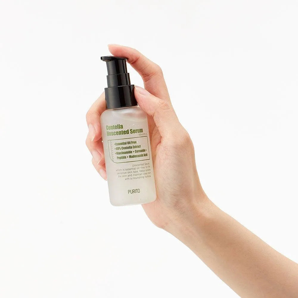 Hand holding Purito Centella Unscented Serum bottle, Korean skincare Me Time Groningen