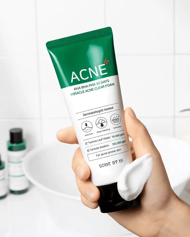 Hand holding Some By Mi AHA BHA PHA 30 Days Miracle Acne Clear Foam, Korean skincare product