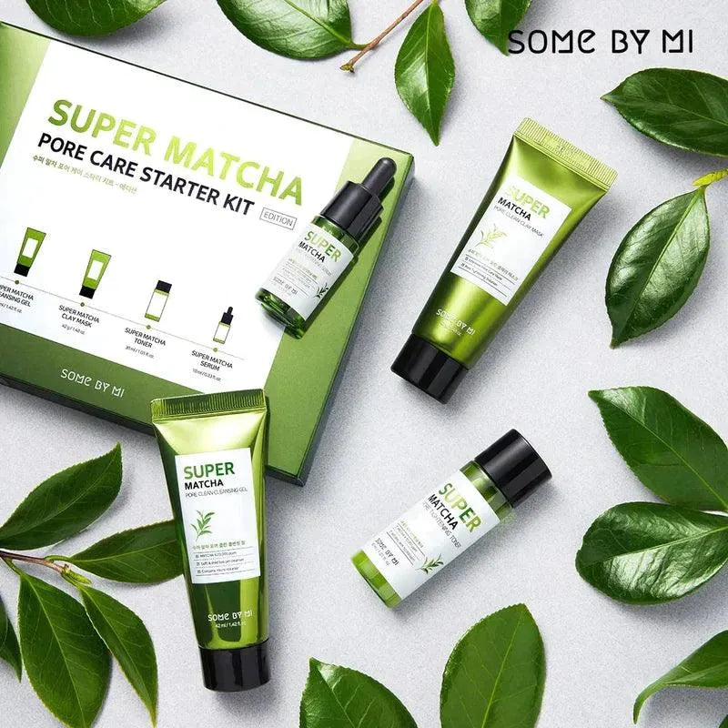 Some By Mi Super Matcha Pore Care Starter Kit with Korean skincare products on green leaves.