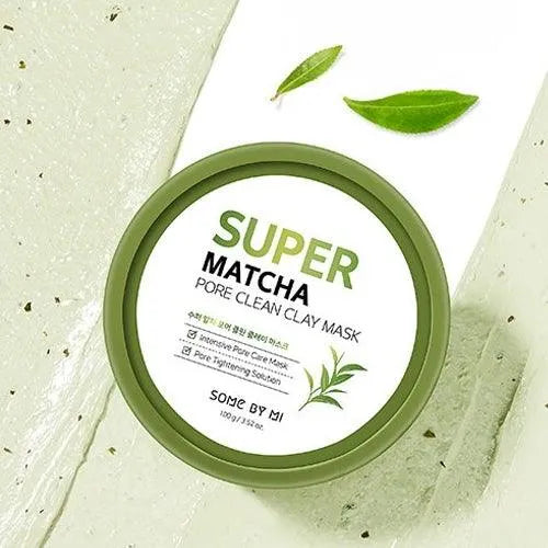 Some By Mi Super Matcha Pore Clean Clay Mask Korean skincare product flat lay with green leaves
