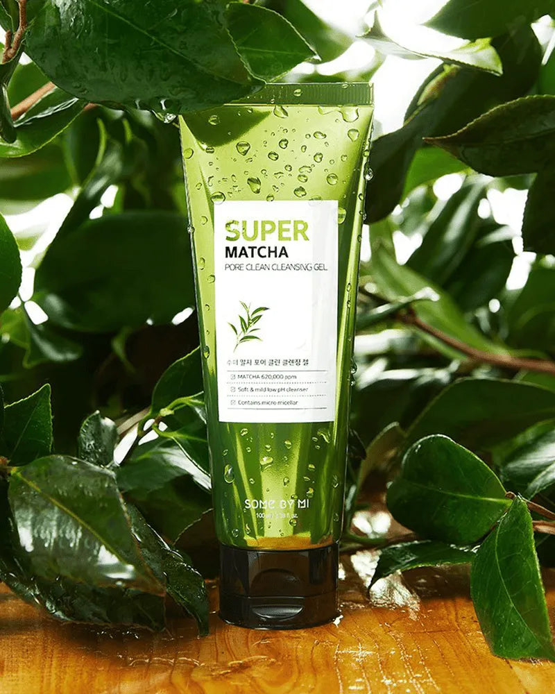 Some By Mi Super Matcha Pore Clean Cleansing Gel in green tube with water drops, surrounded by leaves
