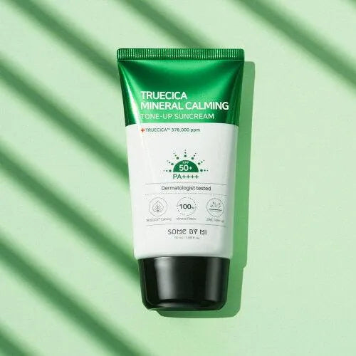 Some By Mi Truecica Mineral Calming Tone-Up Suncream on green background, Korean skincare
